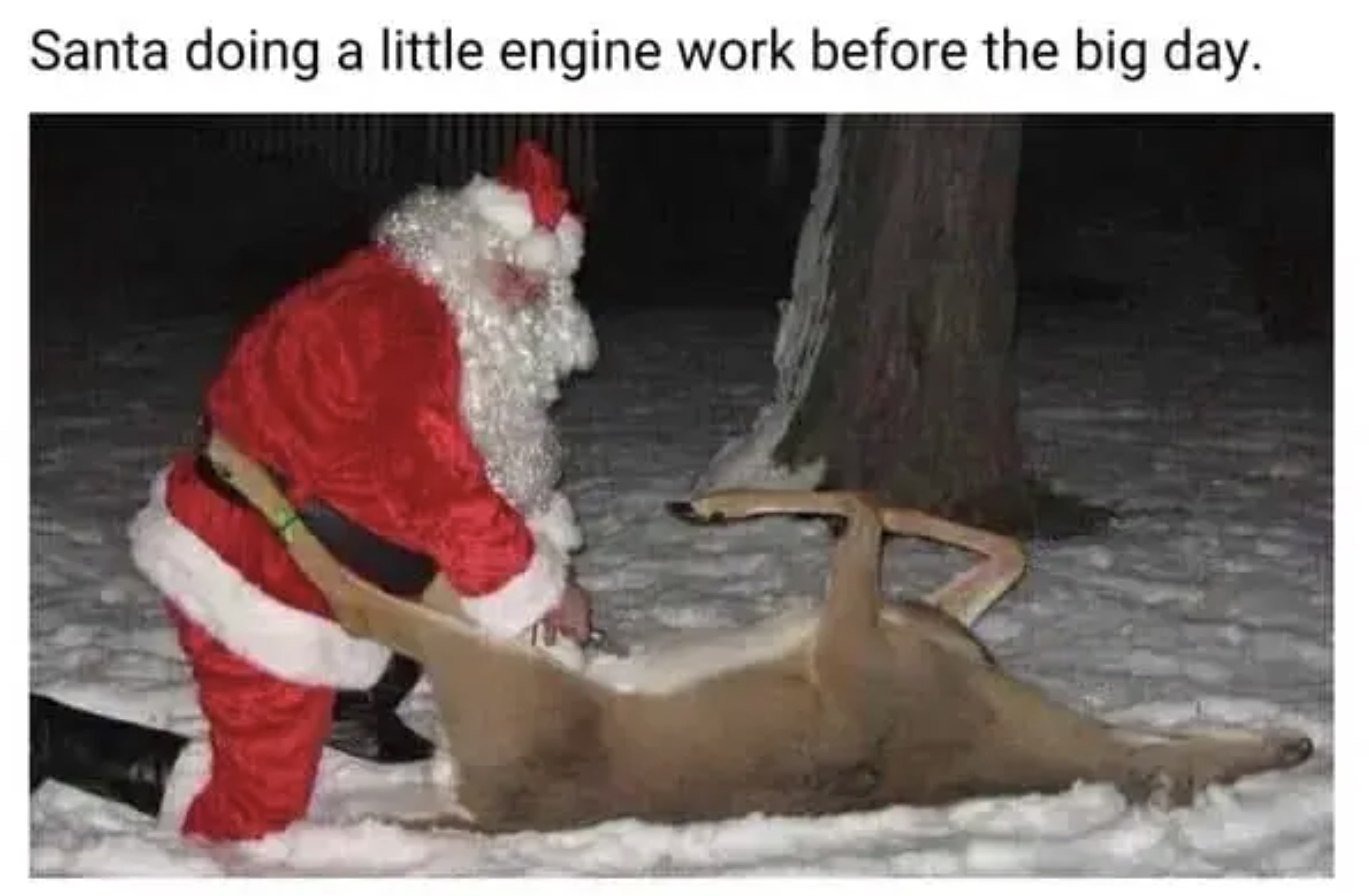 santa claus hunting deer - Santa doing a little engine work before the big day.